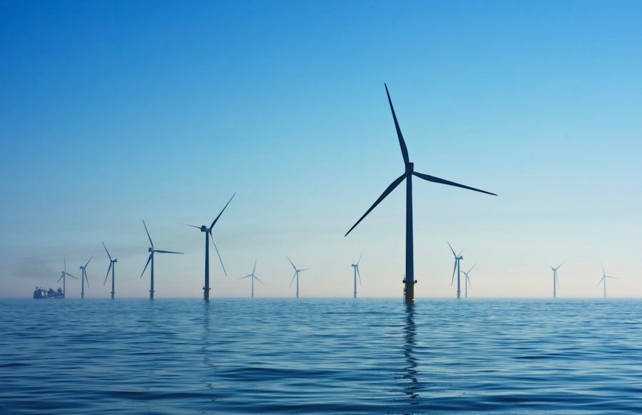 Wind turbines at dusk representing PayQuid Baltic energy access